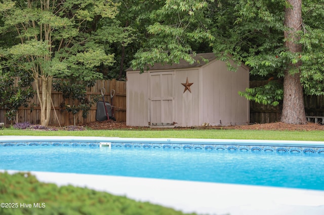 4109 Devonshire Ln, Wilmington, NC 28409 - view of swimming pool with a storage shed