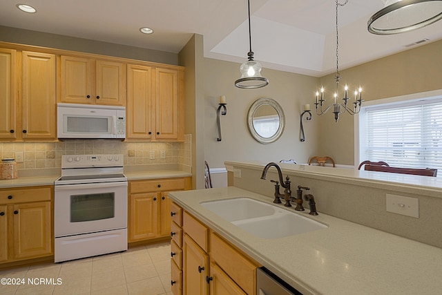 8975 Smithfield Dr NW Apt 2, Calabash, NC 28467 - kitchen featuring white appliances, backsplash, light countertops, light tile patterned floors, and pendant lighting