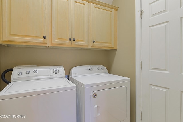 8975 Smithfield Dr NW Apt 2, Calabash, NC 28467 - laundry area featuring cabinet space and washer and clothes dryer