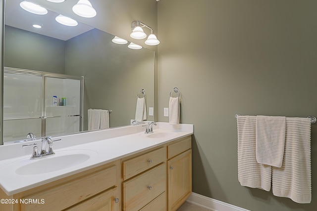 8975 Smithfield Dr NW Apt 2, Calabash, NC 28467 - full bath with double vanity and a shower with door