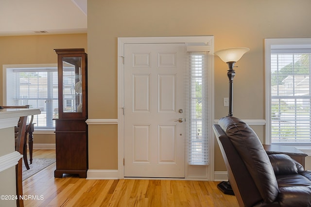 8975 Smithfield Dr NW Apt 2, Calabash, NC 28467 - entrance foyer featuring light wood-type flooring and baseboards