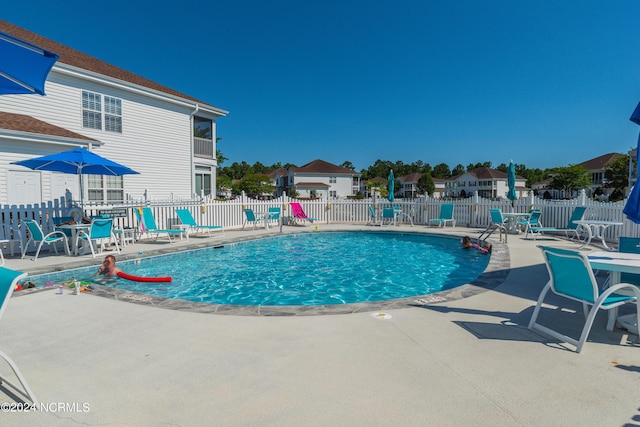 8975 Smithfield Dr NW Apt 2, Calabash, NC 28467 - community pool with a patio