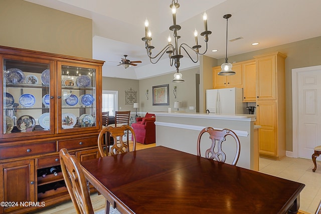 8975 Smithfield Dr NW Apt 2, Calabash, NC 28467 - dining area with a ceiling fan, light tile patterned floors, recessed lighting, and a chandelier