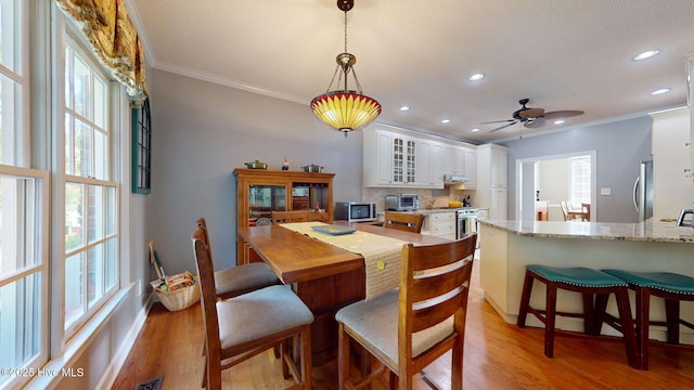 104 Chatham Pass, Trent Woods, NC 28562 - dining room featuring crown molding, light wood-style floors, recessed lighting, and ceiling fan