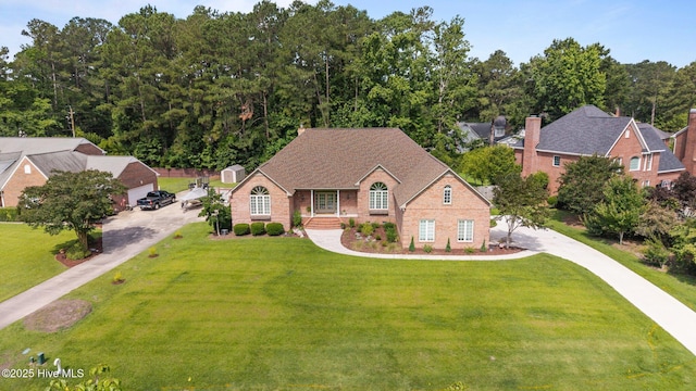 104 Chatham Pass, Trent Woods, NC 28562 - view of front of property with a front lawn and brick siding