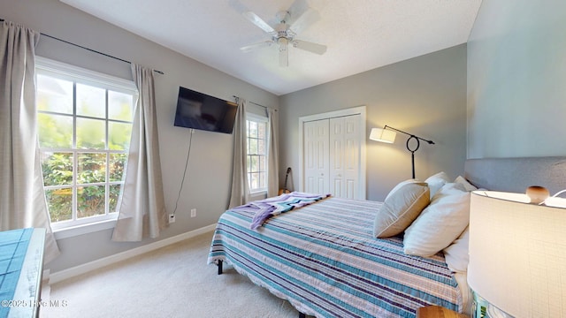 104 Chatham Pass, Trent Woods, NC 28562 - carpeted bedroom featuring a closet and a ceiling fan