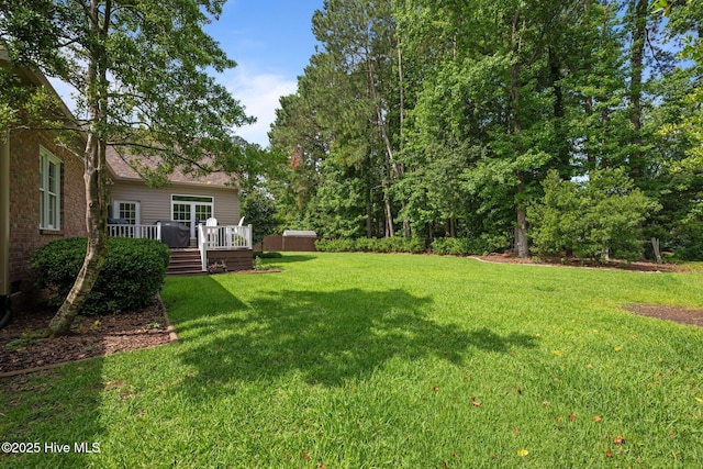 104 Chatham Pass, Trent Woods, NC 28562 - view of grassy yard with a wooden deck