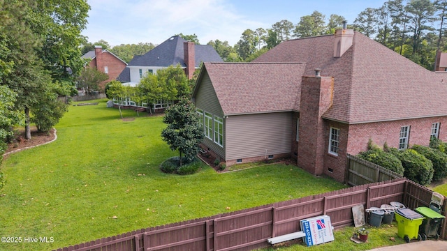 104 Chatham Pass, Trent Woods, NC 28562 - view of home's exterior featuring a chimney, roof with shingles, and crawl space