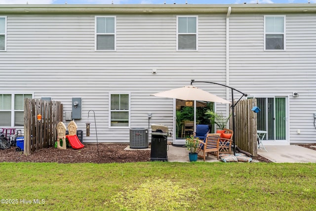 1571 Grey Cliff Run, Wilmington, NC 28405 - rear view of house with a patio area and a yard