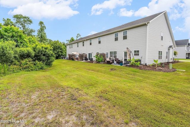 1571 Grey Cliff Run, Wilmington, NC 28405 - rear view of property with a yard, outdoor lounge area, and a patio area