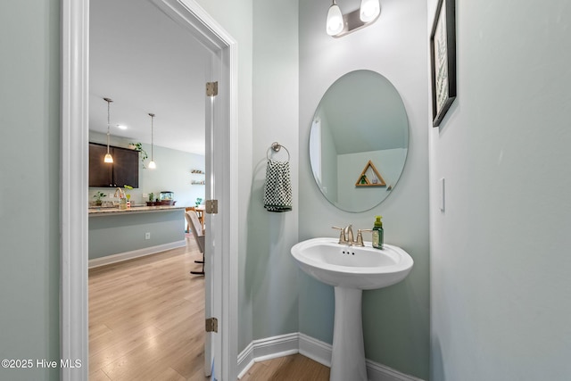 1571 Grey Cliff Run, Wilmington, NC 28405 - bathroom with wood finished floors and a sink