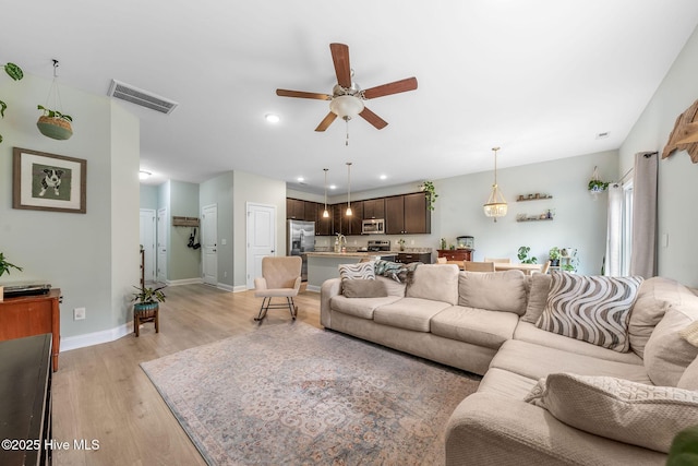 1571 Grey Cliff Run, Wilmington, NC 28405 - living area with light wood-style flooring, ceiling fan, and recessed lighting