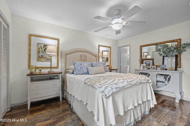 600 N 35th St Unit 201, Morehead City, NC 28557 - bedroom featuring dark wood finished floors, a closet, and ceiling fan