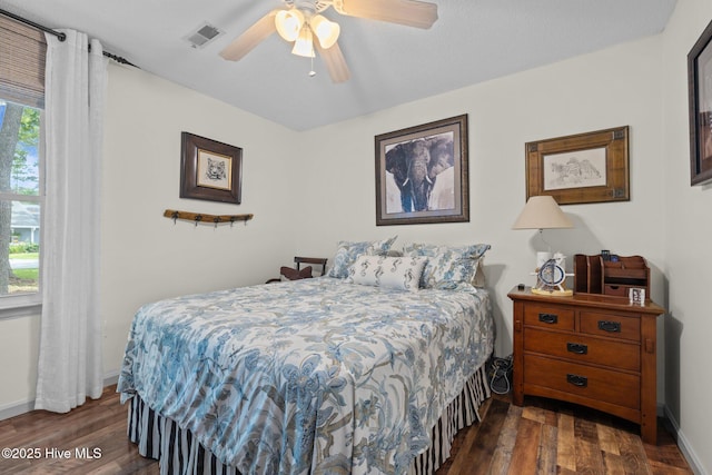 600 N 35th St Unit 201, Morehead City, NC 28557 - bedroom with wood finished floors and ceiling fan