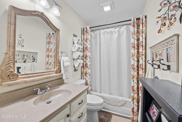 600 N 35th St Unit 201, Morehead City, NC 28557 - bathroom with vanity, shower / bathtub combination with curtain, and wood finished floors