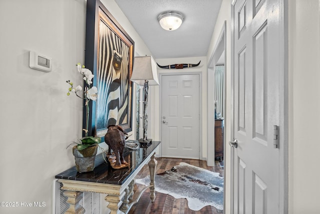 600 N 35th St Unit 201, Morehead City, NC 28557 - entryway featuring wood finished floors and a textured ceiling