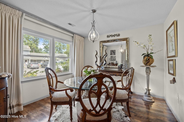 600 N 35th St Unit 201, Morehead City, NC 28557 - dining area featuring wood finished floors and a textured ceiling