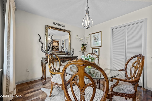 600 N 35th St Unit 201, Morehead City, NC 28557 - dining space with wood finished floors and a chandelier