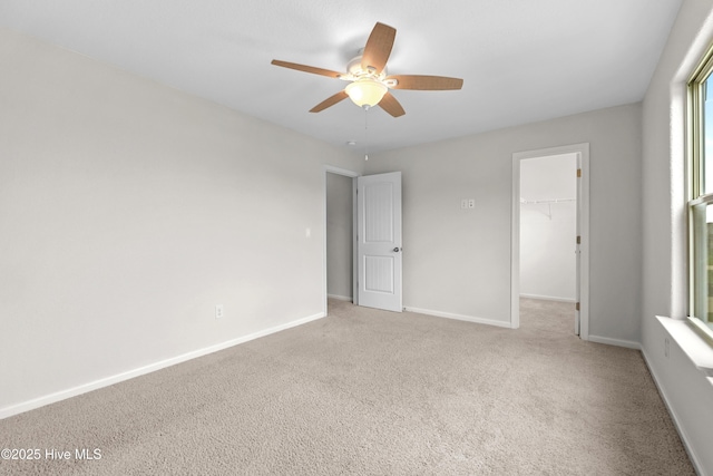 132 Mill Run, South Mills, NC 27976 - unfurnished bedroom with a spacious closet, carpet, a closet, and ceiling fan
