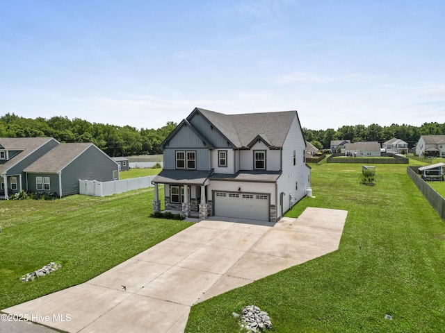 132 Mill Run, South Mills, NC 27976 - view of front of house featuring an attached garage, stone siding, concrete driveway, and a shingled roof