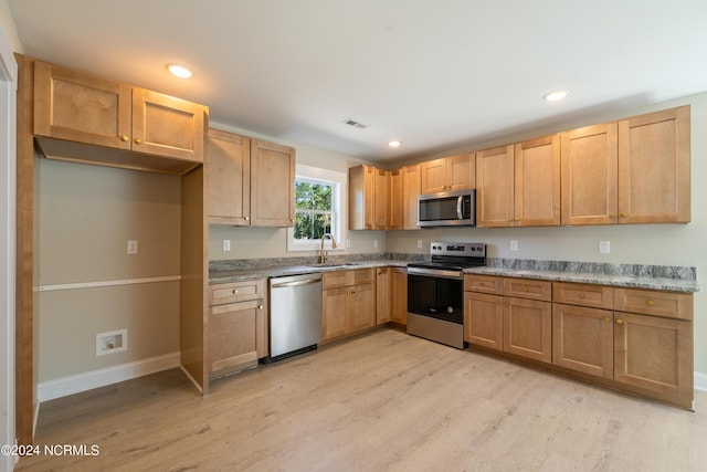 72 S Greensboro Rd, Southport, NC 28461 - kitchen with stainless steel appliances, light wood finished floors, and recessed lighting