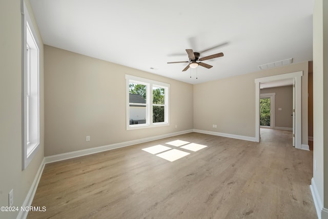 72 S Greensboro Rd, Southport, NC 28461 - spare room with plenty of natural light, a ceiling fan, and light wood finished floors