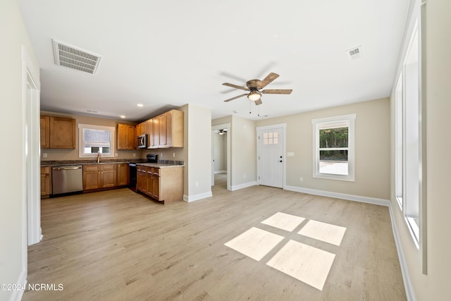 72 S Greensboro Rd, Southport, NC 28461 - kitchen featuring stainless steel appliances, ceiling fan, healthy amount of natural light, light wood-style floors, and recessed lighting