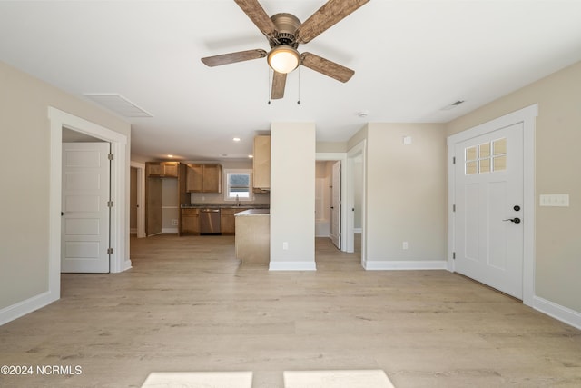72 S Greensboro Rd, Southport, NC 28461 - unfurnished living room with light wood-style flooring, recessed lighting, and a ceiling fan