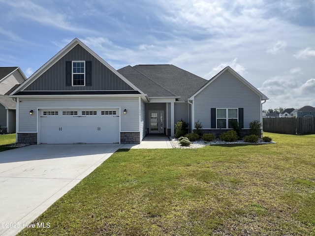 204 Old Field School Ln, Jacksonville, NC 28546 - craftsman inspired home featuring board and batten siding, concrete driveway, stone siding, and a garage