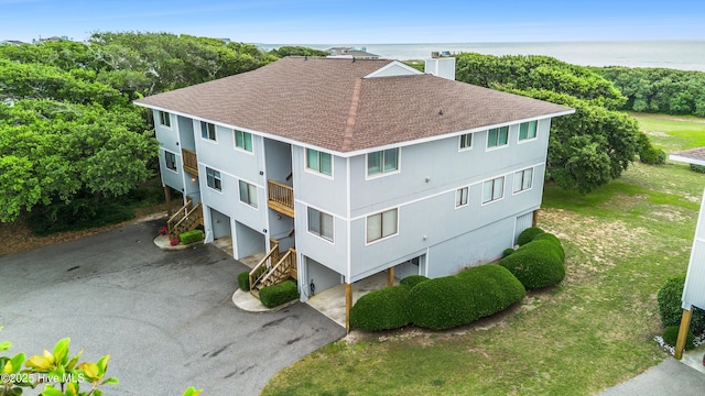 11 Foxfire Trce, Oak Island, NC 28465 - view of subject property with a nearby body of water