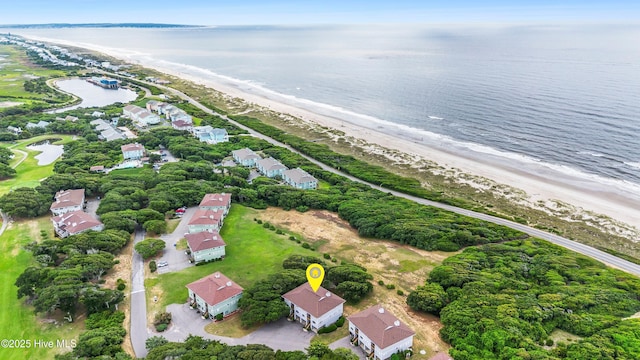 11 Foxfire Trce, Oak Island, NC 28465 - aerial overview of property's location featuring waterfront with a beach