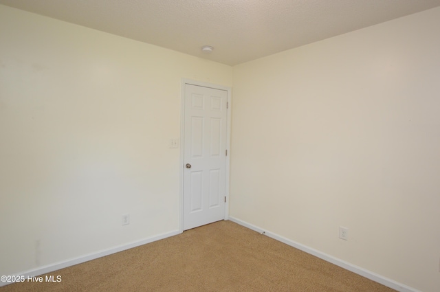 140 Van Riggs Rd, Hubert, NC 28539 - unfurnished room featuring light carpet and a smoke detector
