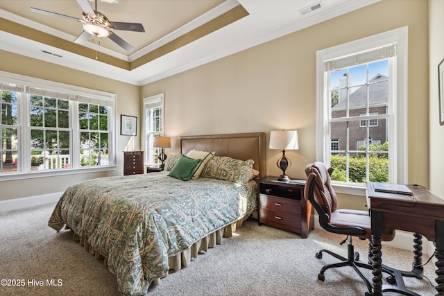 8812 Fazio Dr, Wilmington, NC 28411 - carpeted bedroom with crown molding, multiple windows, an office area, a raised ceiling, and a ceiling fan