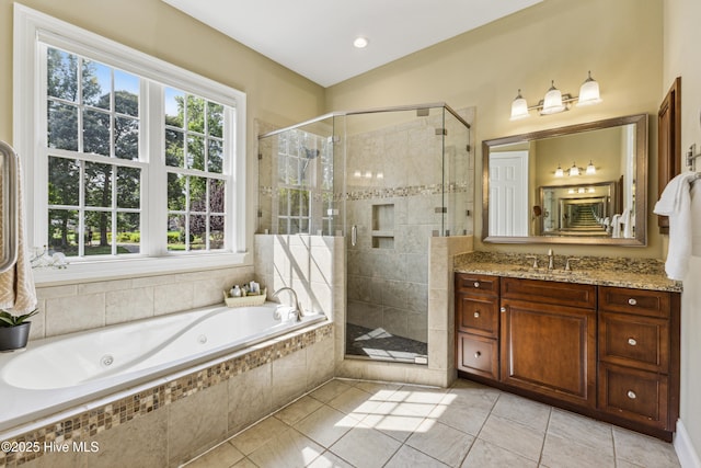 8812 Fazio Dr, Wilmington, NC 28411 - bathroom with a tub with jets, a shower stall, vanity, and tile patterned flooring