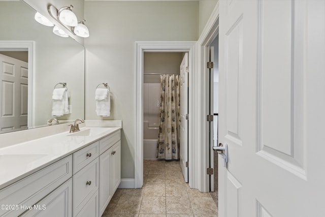 8812 Fazio Dr, Wilmington, NC 28411 - full bathroom with double vanity, shower / tub combo, and tile patterned floors