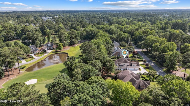 8812 Fazio Dr, Wilmington, NC 28411 - drone / aerial view of a golf course and a nearby body of water