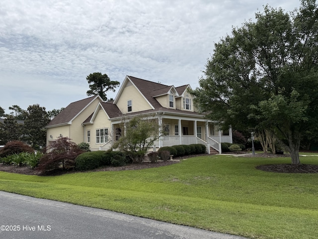 4302 Stillwater Cv SE, Southport, NC 28461 - view of property exterior featuring covered porch and a yard