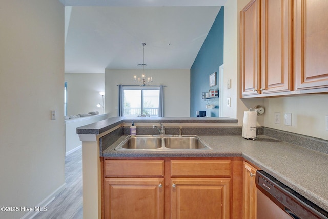 213 Fullford Ln Unit 201, Wilmington, NC 28412 - kitchen with stainless steel dishwasher, a peninsula, a chandelier, open floor plan, and light wood finished floors