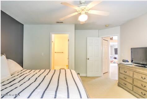 226 Bandon Dr, New Bern, NC 28562 - bedroom featuring light carpet, a ceiling fan, and ensuite bathroom