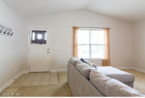 226 Bandon Dr, New Bern, NC 28562 - carpeted entryway with lofted ceiling and tile patterned flooring