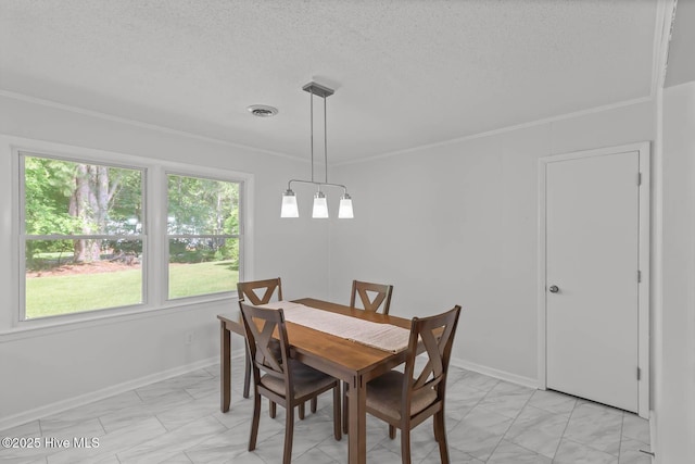 1292 Lake Cole Rd, Midway Park, NC 28544 - dining space with light marble finish flooring, ornamental molding, and a textured ceiling