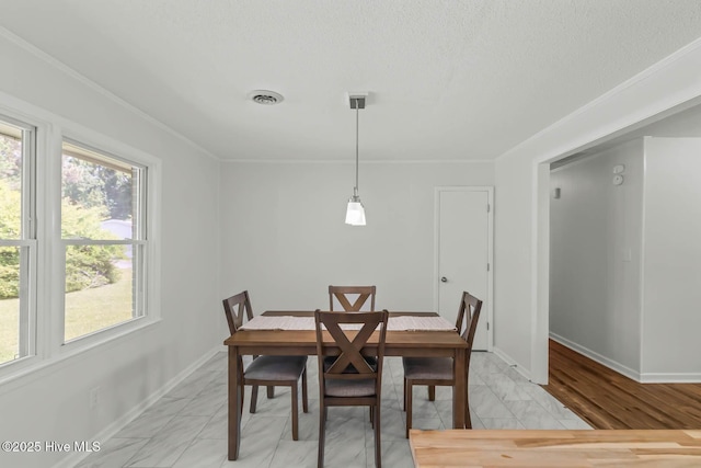 1292 Lake Cole Rd, Midway Park, NC 28544 - dining room featuring light marble finish floors and crown molding