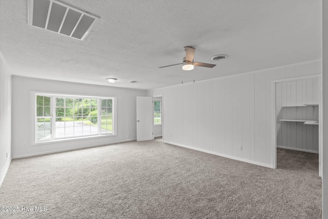 1292 Lake Cole Rd, Midway Park, NC 28544 - carpeted empty room with ceiling fan and a textured ceiling