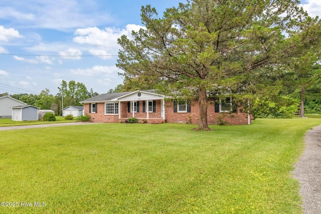 1292 Lake Cole Rd, Midway Park, NC 28544 - single story home with brick siding, a front yard, and driveway