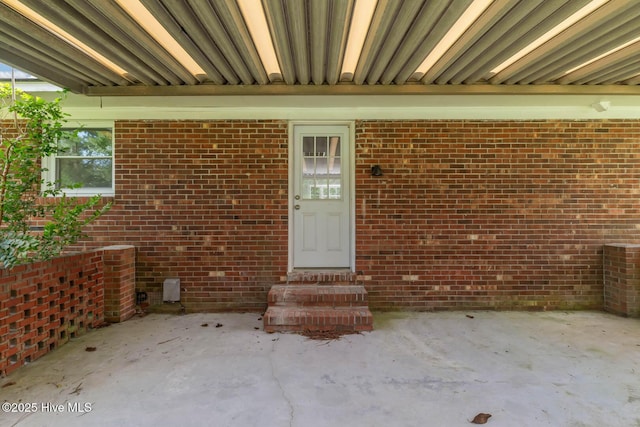 1292 Lake Cole Rd, Midway Park, NC 28544 - property entrance with a patio and brick siding