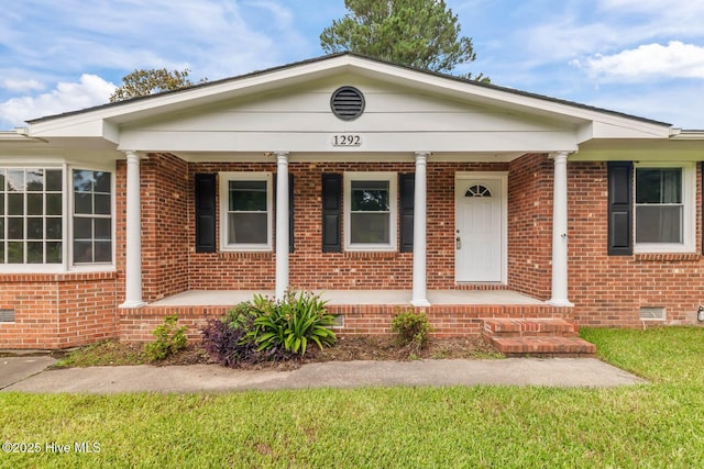 1292 Lake Cole Rd, Midway Park, NC 28544 - view of front facade with a porch and brick siding