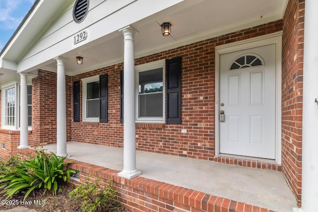 1292 Lake Cole Rd, Midway Park, NC 28544 - property entrance with a porch and brick siding