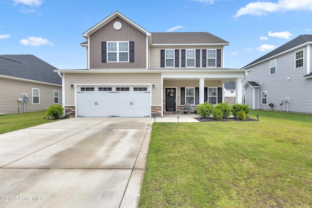 324 Windmill Light Way, Sneads Ferry, NC 28460 - view of front of property featuring a porch, a garage, concrete driveway, a front lawn, and board and batten siding