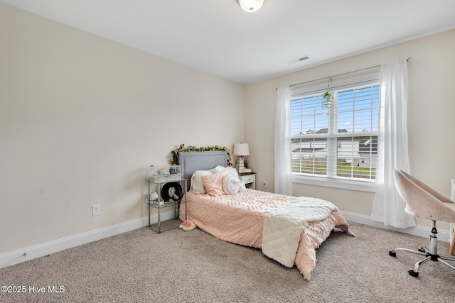 324 Windmill Light Way, Sneads Ferry, NC 28460 - carpeted bedroom featuring baseboards