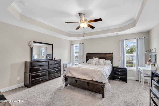 324 Windmill Light Way, Sneads Ferry, NC 28460 - bedroom featuring a raised ceiling, crown molding, multiple windows, carpet, and a ceiling fan